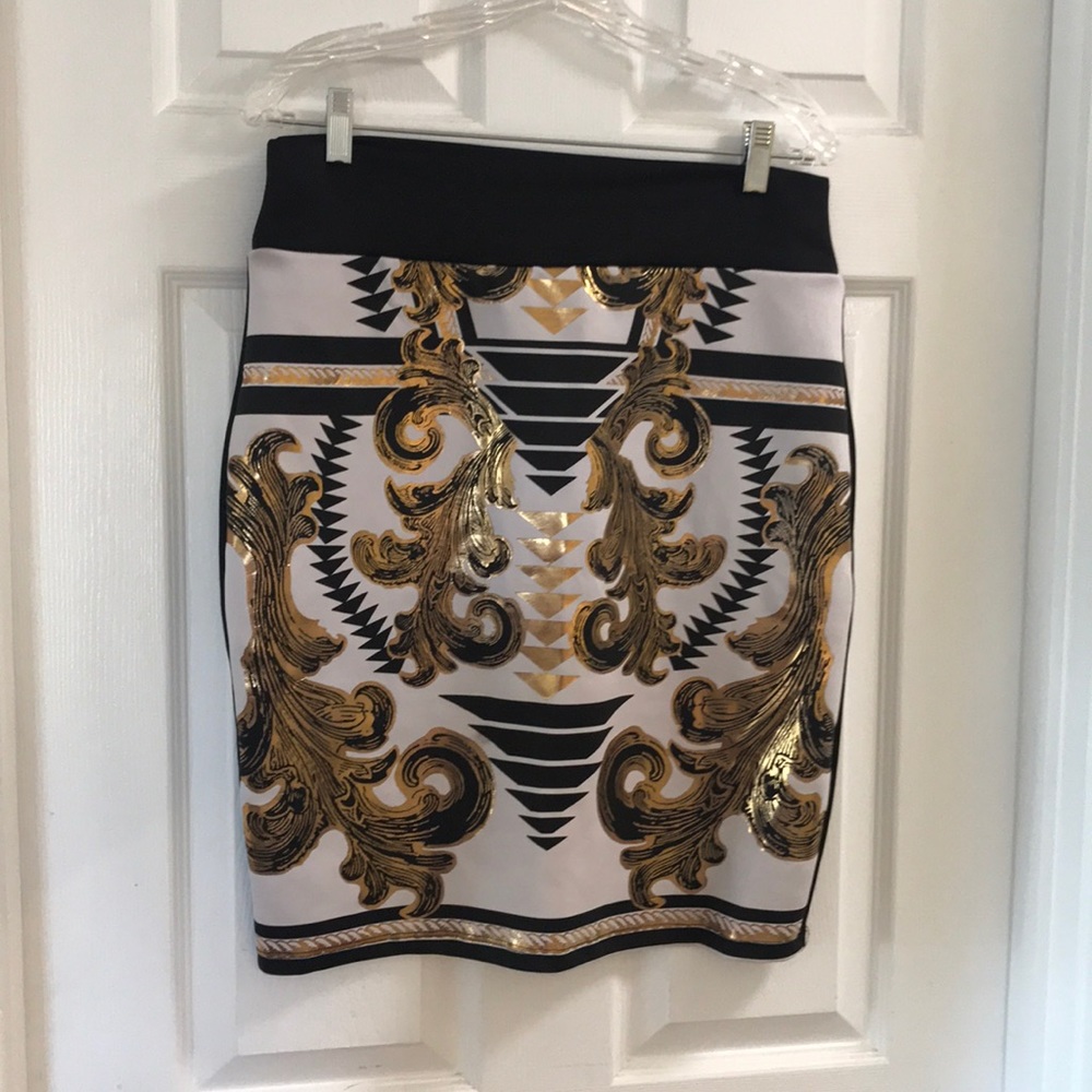 Ahold and black skirt
